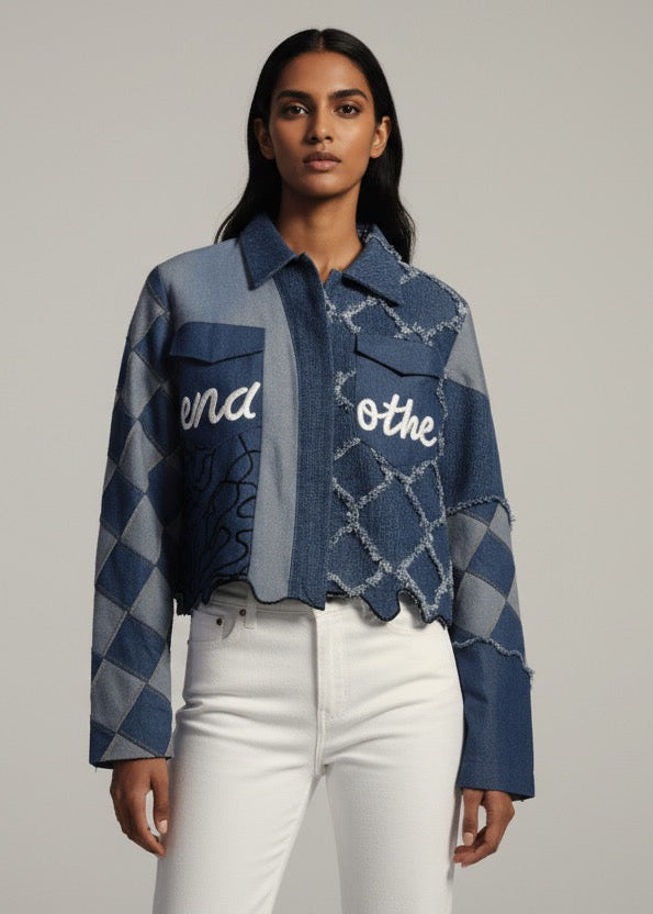 Woman wearing a blue patterned jacket with text on a gray background