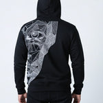 Black hoodie with geometric design on the back against a white background