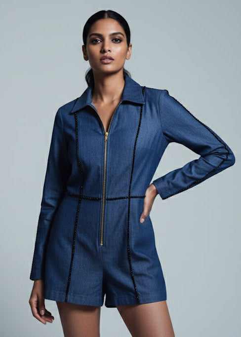 Woman wearing a blue jacket on a gray background